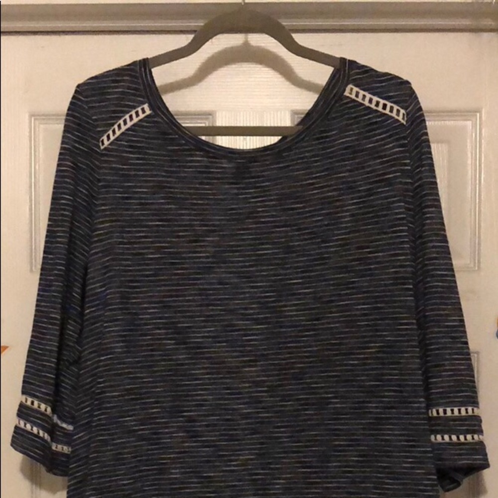 Blue and white striped shirt.